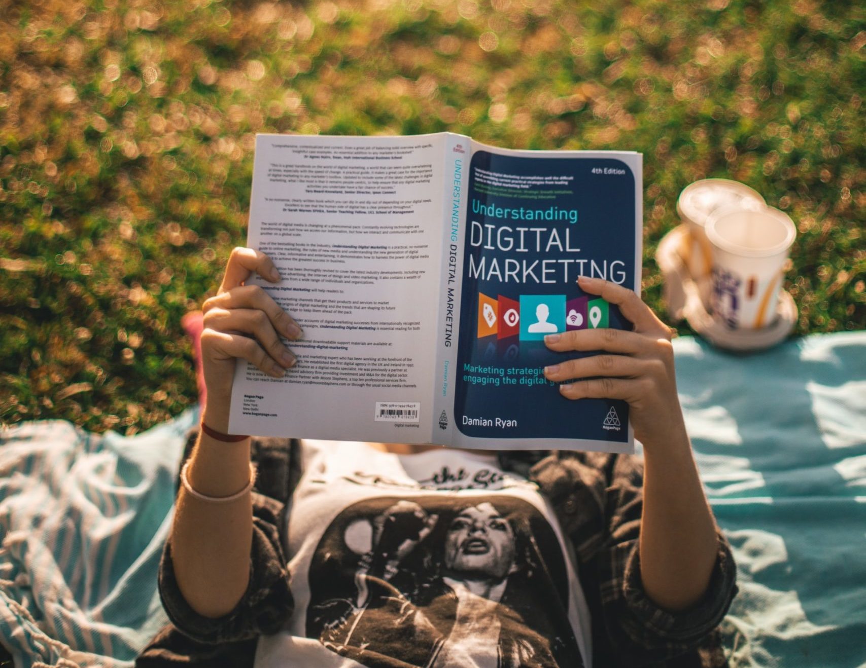 girl reading a book on understanding digital marketing in 2023 - white hat vs black hat seo